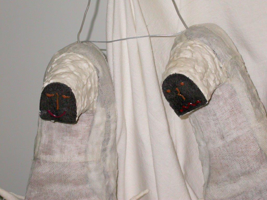 Galleria Teatro Comunale di Lonigo (ottobre 2002) -  "Penitenza" di Rosanna Granconato - 2002 lasciata in  donazione alla Galleria del Teatro Comunale di Lonigo (Vi) dopo la  mostra di Fiabe per Adulti. Costruzione con scarpe riciclate/Una metafora con la leggerezza  dell'ironia sulla sopportazione umana tra gli umani /materiali: gesso,  garza di cotone, colori acrilici, noccioli di pesca e guarana.